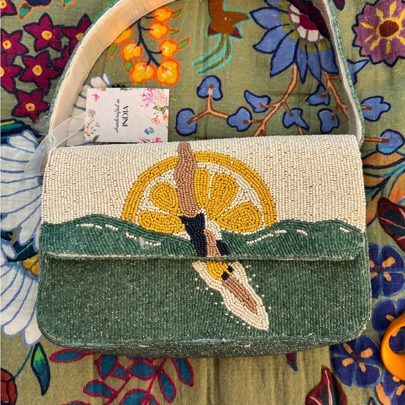 handcrafted in India Handbags - Handcrafted Beaded Clutch with sun  Design